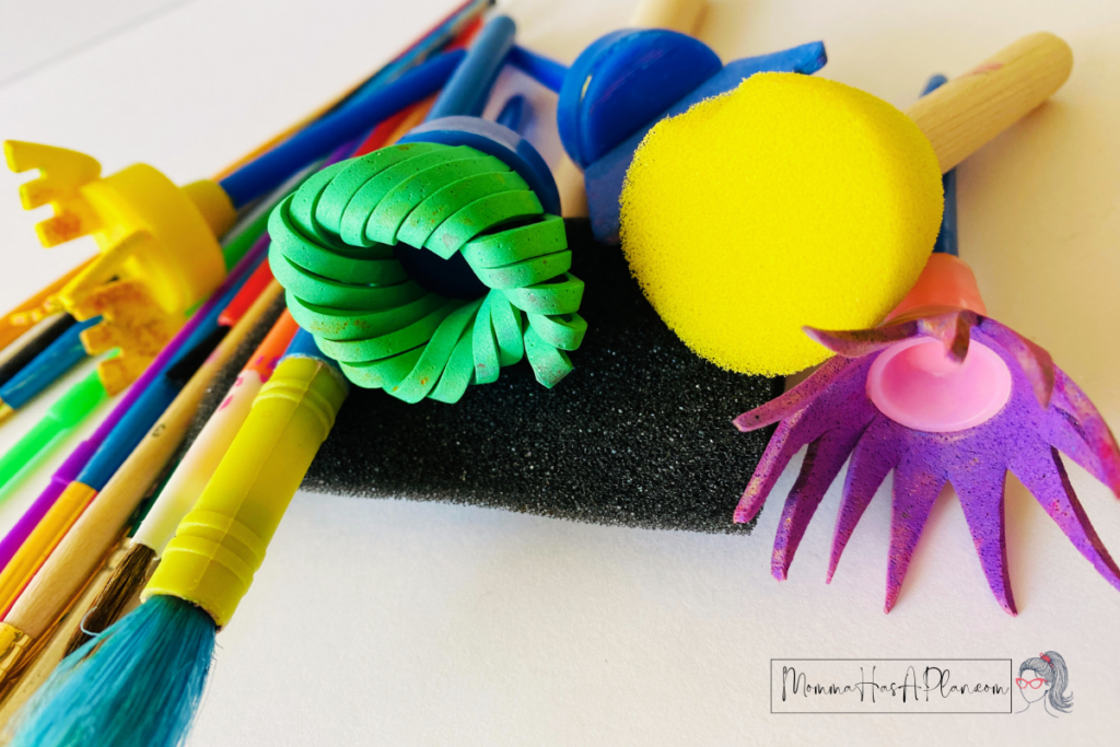 Try out different painting tools in your art supplies for toddlers 