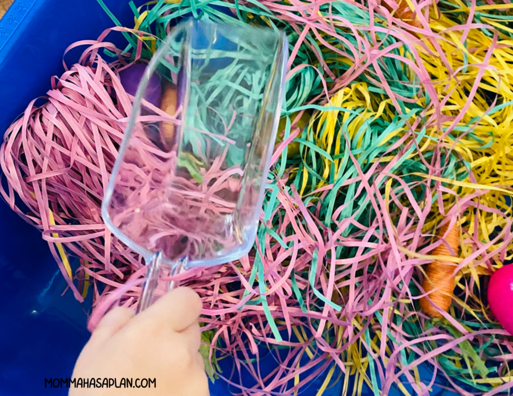 sensory bin with shredded paper